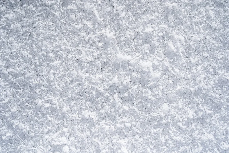 a close up of a white marble surface